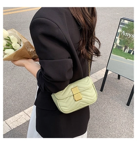 Sage green chevron quilted crossbody bag with gold metal chain and clasp closure