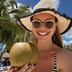 Retro cat-eye sunglasses with small frames and a beach vacation straw hat set