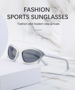 Close-up of silver matte Y2K punk sunglasses with sleek streamlined frame on display