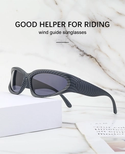 Close-up of carbon fiber texture and aerodynamic frame on professional cycling sunglasses