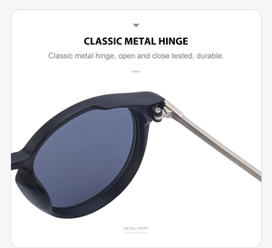 Detailed macro view of classic metal hinges on retro cat-eye sunglasses for durability