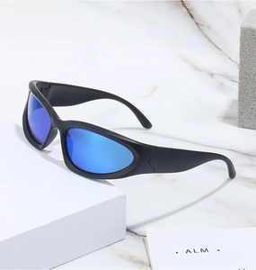 Close-up of cycling sports sunglasses with matte black frames and blue mirrored lenses