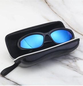 Sports sunglasses with blue mirrored lenses and a black textured leather zipper case