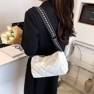 Minimalist white quilted PU leather crossbody bag with stylish patterned wide strap