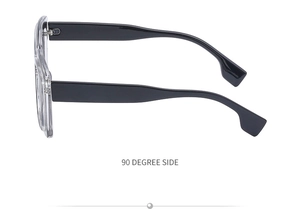 Side view of cat-eye sunglasses with transparent frames and wide black wave-shaped temples