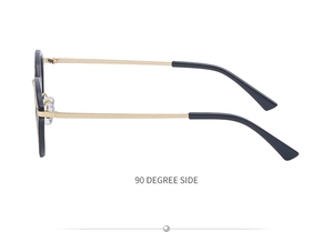 Detailed side view of retro cat eye sunglasses with black frame and gold metal temples