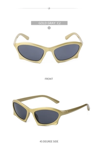 Detail of gold punk sunglasses with dark gray lenses and sharp angular frame design