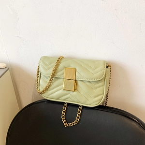 Quilted mint green leather crossbody bag with V-pattern stitching and gold chain strap