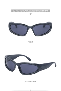 Detail of matte black carbon fiber texture frame and gray lenses on sports cycling sunglasses