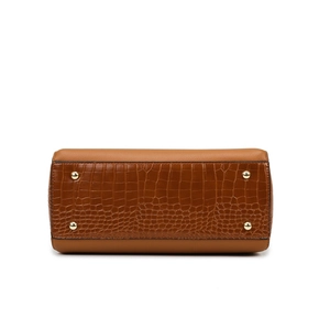 Bottom view of large caramel tote bag with faux crocodile texture and gold protective studs