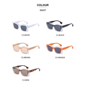Chic cat eye sunglasses in white, black, brown, and orange color variations for women