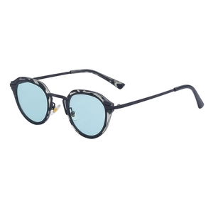 Retro small frame cat eye sunglasses with light blue lenses and marble pattern frame