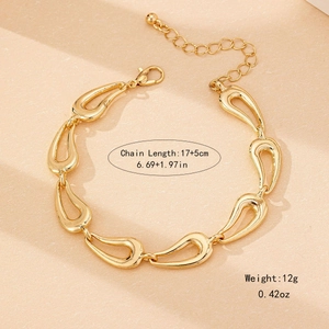 Fashionable gold link bracelet featuring teardrop-shaped segments and adjustable chain
