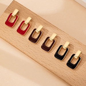 Elegant geometric square earrings set with colorful enamel in gold metal frames