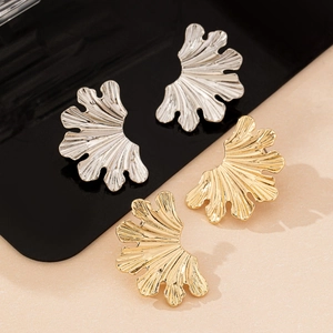 Elegant gold and silver leaf texture earrings with radial coral pattern design