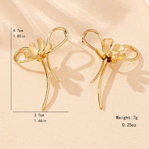 Elegant gold flower bow earrings with polished finish and size dimensions shown