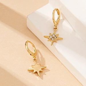 Elegant gold eight-point star drop hoop earrings with sparkling diamond accents