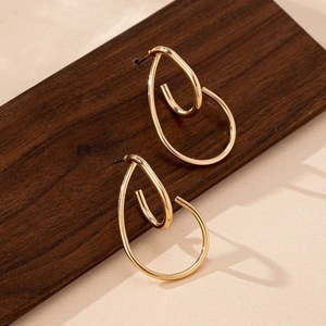Minimalist double layered gold geometric hoop earrings with elegant teardrop shape