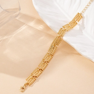 Minimalist gold-plated modular beaded V-chain bracelet with adjustable lobster clasp closure