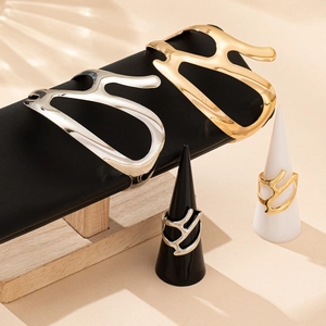 Modern irregular cutout open cuff bracelet and ring set in polished gold and silver finish