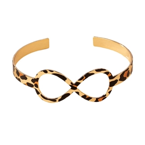 Golden open cuff bracelet with leopard print infinity symbol in minimalist retro style