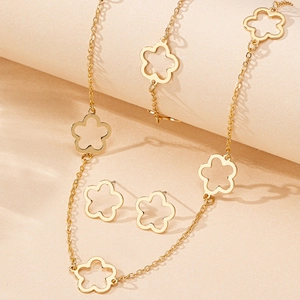 Elegant gold-plated hollow clover jewelry set including a necklace and stud earrings