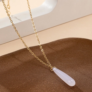 Minimalist gold chain necklace with a long lavender chalcedony teardrop pendant