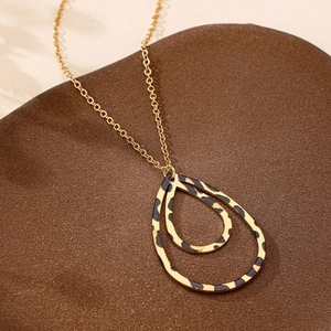 Collana vintage di tendenza con ciondolo a goccia traforato a doppio leopardo