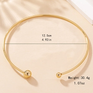 Elegant gold-tone stiff open choker with polished beads, 12.5cm diameter for women