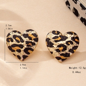Romantic gold heart stud earrings with leopard print and hammered metal texture finish