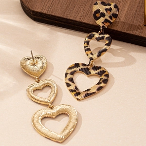 Leopard print heart drop earrings with hollow gold frames shown from front and back view