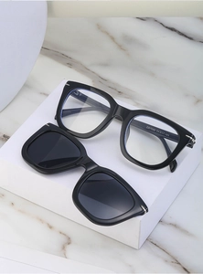 Detail of DB7088 magnetic clip-on sunglasses with black frames and silver arrow accents