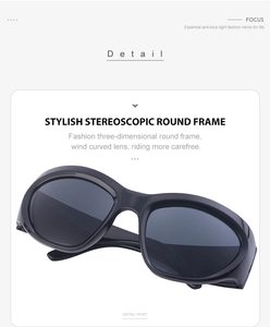 Détail de lunettes de soleil rondes noires stéréoscopiques avec verres anti-lumière bleue