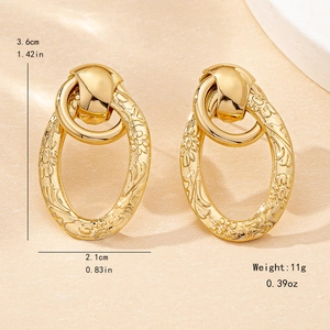 Vintage hollow oval earrings with floral relief and gold plating for women
