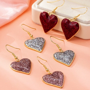 Sparkly heart-shaped drop earrings in red, silver, and purple glitter for women