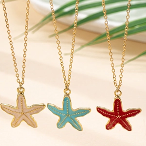 Elegant gold starfish pendant necklace with colorful enamel available in three summer colors