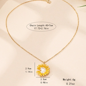 Golden daisy pendant necklace with yellow petals and white core on 45cm plus 7cm wave chain