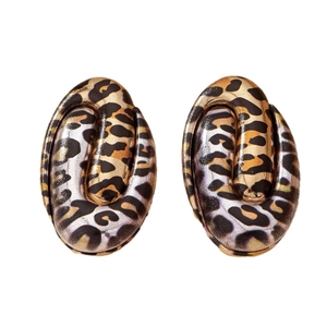 Elegant geometric oval leopard print stud earrings in polished gold and silver metal