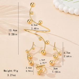 Golden bead jewelry set featuring spiral arm cuff, drop earrings, and open ring for women