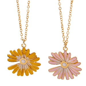 Fashionable gold daisy pendant necklaces with yellow and pink enamel floral designs