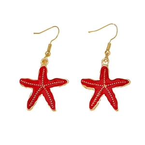 Boucles d'oreilles étoile de mer rouge avec pois dorés et finition émaillée chic