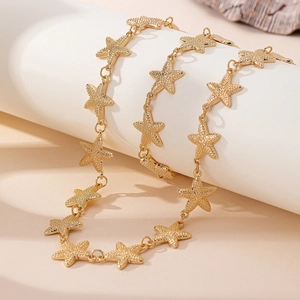 Parure de bijoux élégante collier étoile de mer dorée avec breloques texturées pour la plage