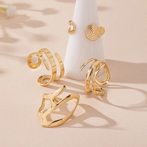4Pcs stylish gold irregular geometric ring set for women with minimalist spiral designs