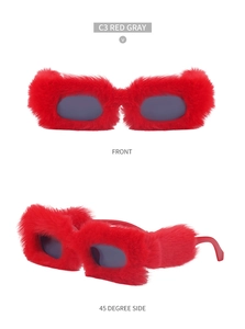 Detail view of red plush square sunglasses with gray lenses in front and 45 degree angles