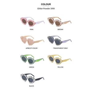 Glitter flower-shaped sunglasses in seven vibrant colors arranged in a symmetrical matrix