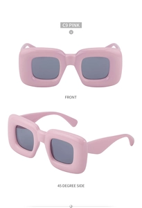 Detail view of pink chunky square frame sunglasses with dark grey lenses and C9 color code