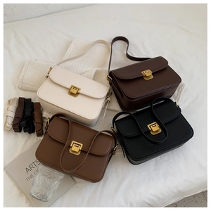 Sacs à bandoulière classiques en quatre couleurs avec fermoirs rotatifs dorés vintage