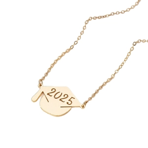 Golden necklace with 2025 graduation cap pendant for students on a white background