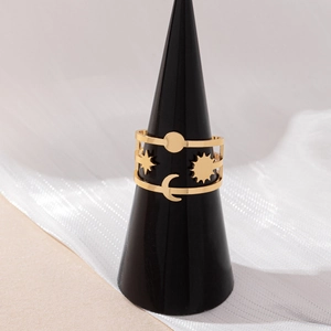 Minimalist gold celestial open ring featuring sun moon and star hollow patterns