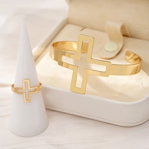 Polished gold-tone hollow cross open bangle and ring jewelry set in a luxury gift box